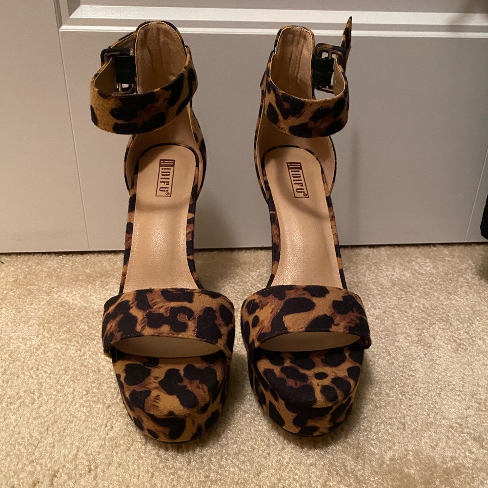 Never worn cheetah heels.